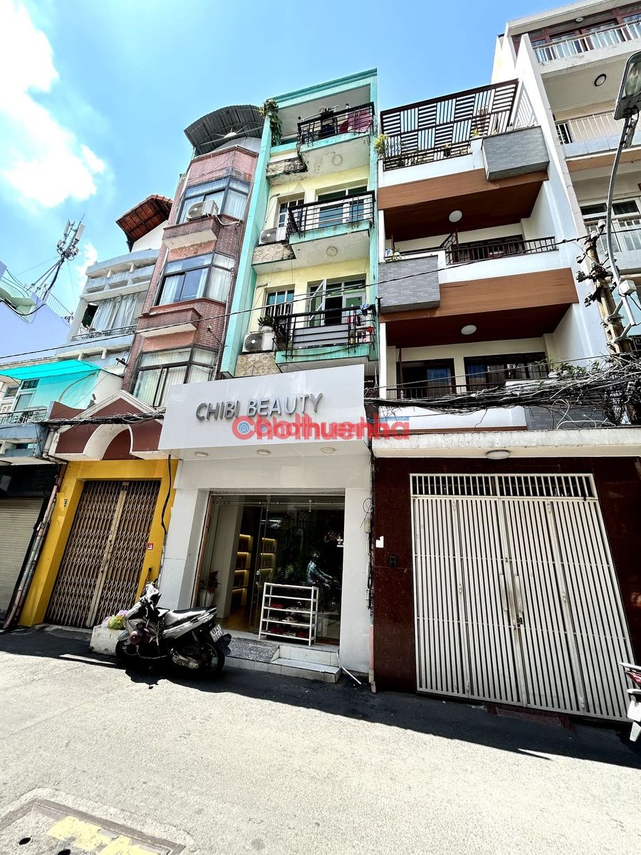 NHÀ MẶT TIỀN ĐƯỜNG SỐ 4 CƯ XÁ ĐÔ THÀNH , PHƯỜNG 4 , QUẬN 3